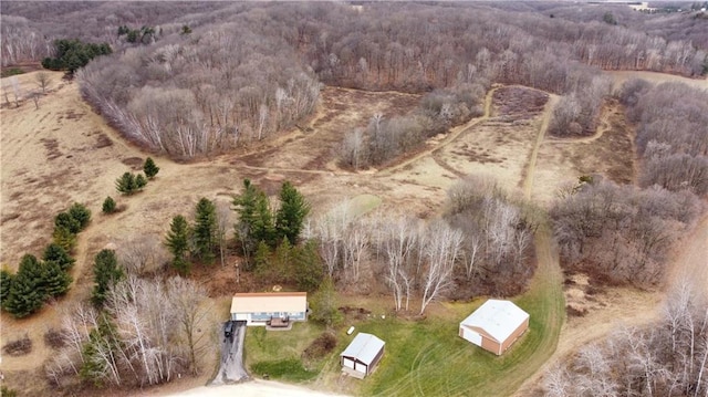 birds eye view of property featuring a rural view