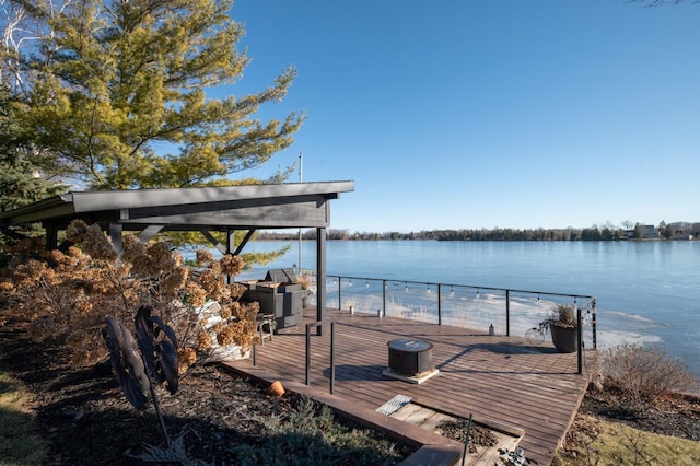 dock area featuring a water view