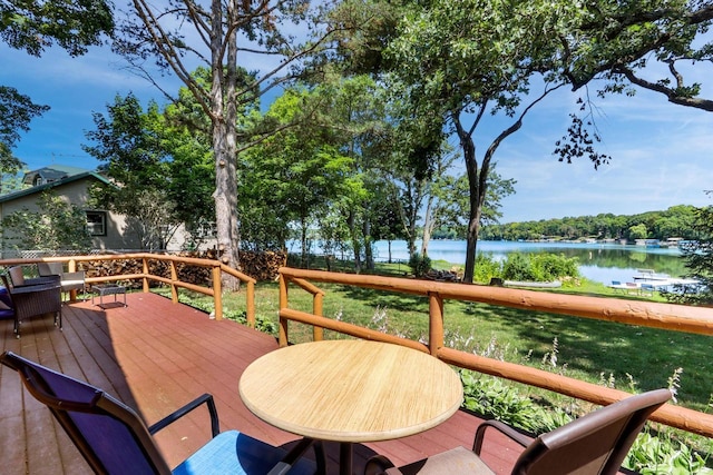 deck featuring a water view