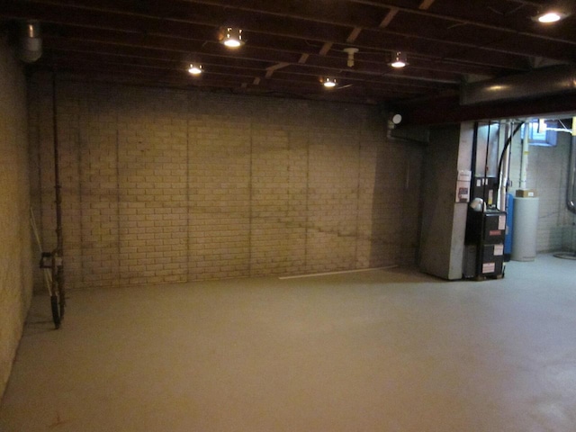 basement featuring heating unit