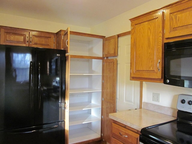 kitchen featuring black appliances