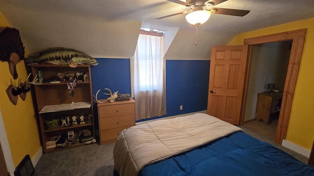 bedroom with carpet floors, ceiling fan, and lofted ceiling