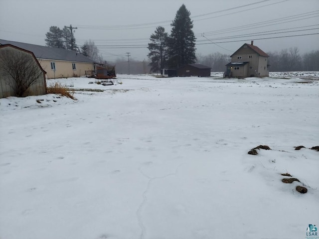 view of snowy yard