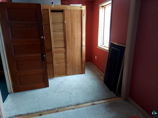 interior space with carpet flooring and a wealth of natural light