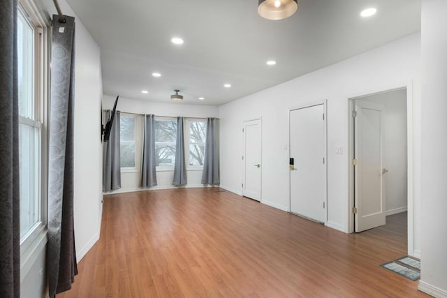 unfurnished room featuring light wood-type flooring