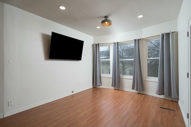 interior space with hardwood / wood-style flooring