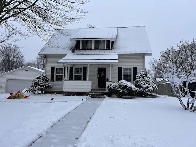 view of front facade with a garage and an outdoor structure