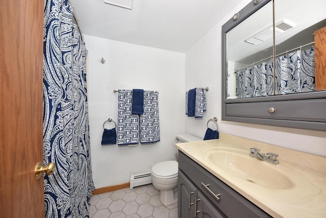 bathroom featuring tile patterned flooring, vanity, toilet, and baseboard heating