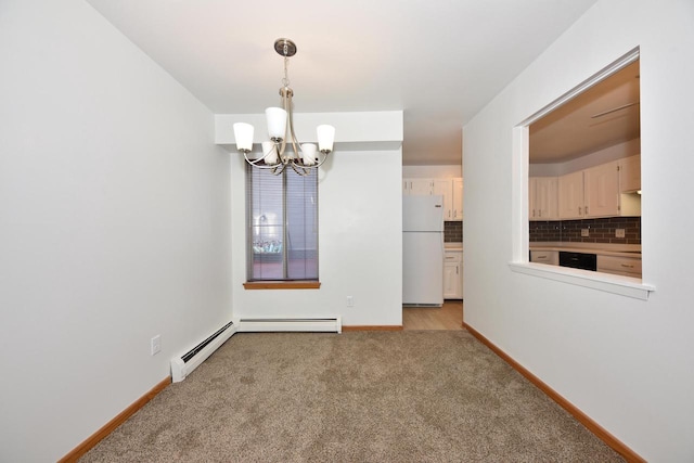 unfurnished dining area featuring baseboard heating, light carpet, and an inviting chandelier