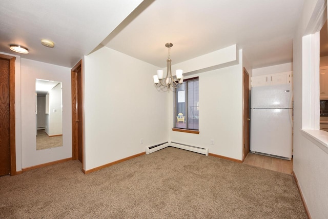 empty room with light carpet, a baseboard radiator, and an inviting chandelier