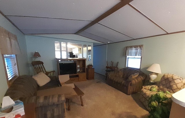 carpeted living room featuring vaulted ceiling