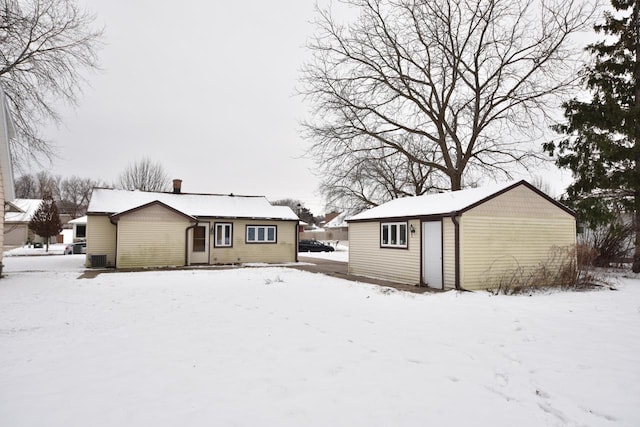 view of snow covered house