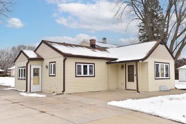 view of snow covered property