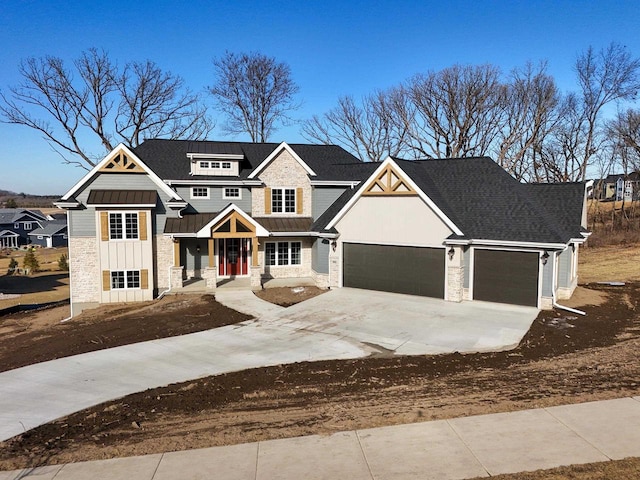 view of front of house featuring a garage and a porch