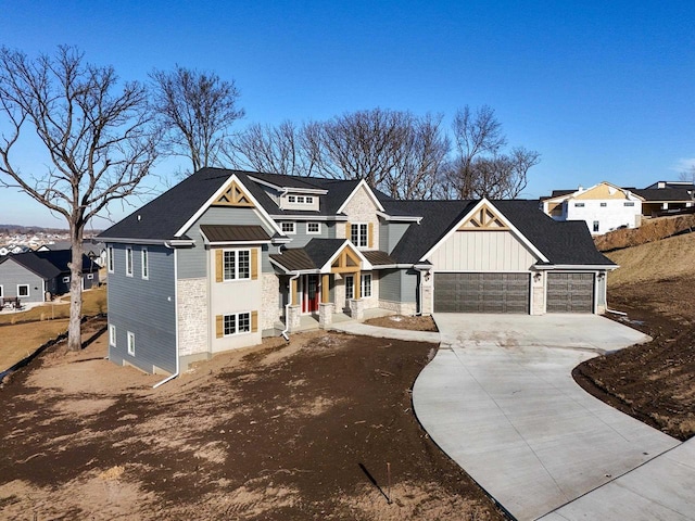 view of front of home with a garage