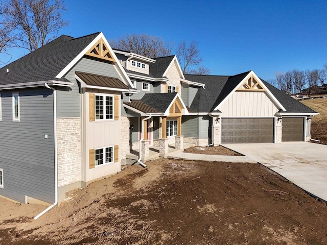 craftsman inspired home featuring a garage