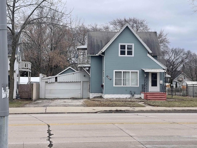 view of front of house with an outbuilding and a garage