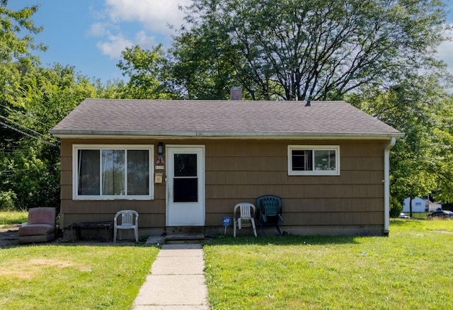 view of front of home with a front yard