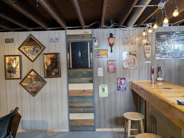 interior space featuring wood walls