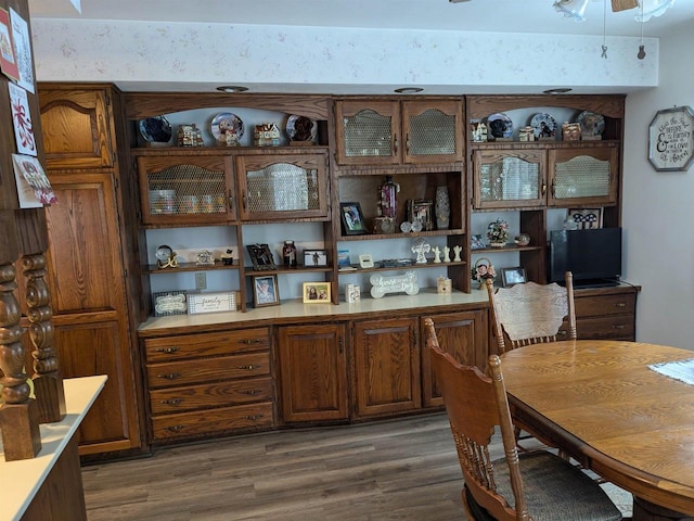 interior space featuring dark hardwood / wood-style floors and ceiling fan