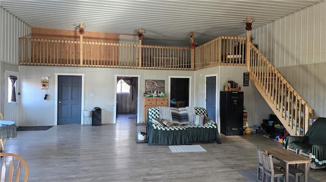 living room featuring a high ceiling