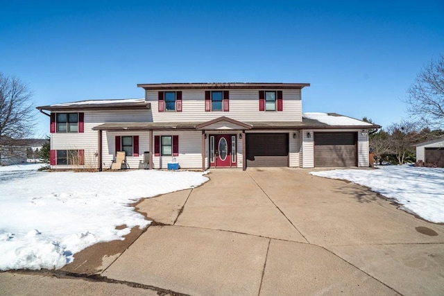 view of front of home with a garage