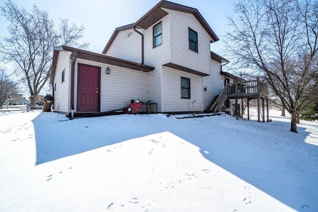 view of snow covered house