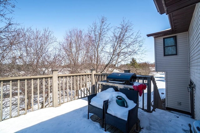 view of snow covered patio