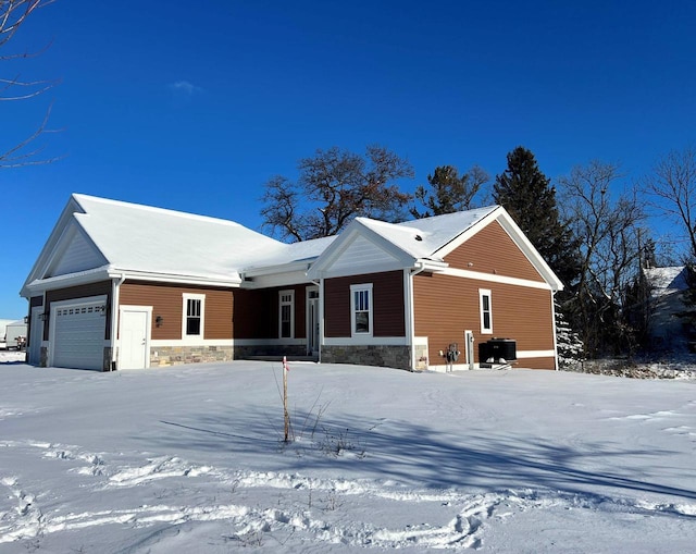 single story home with a garage