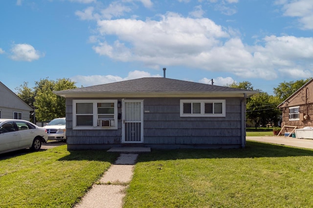 bungalow with a front yard