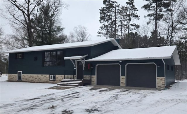 view of front of property with a garage