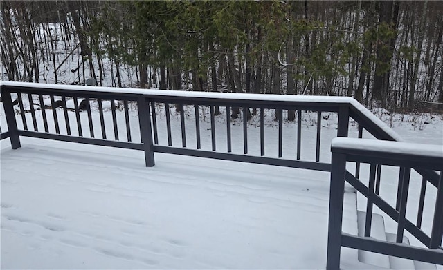 view of snow covered deck