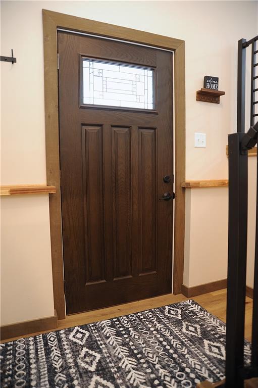 foyer with light hardwood / wood-style floors