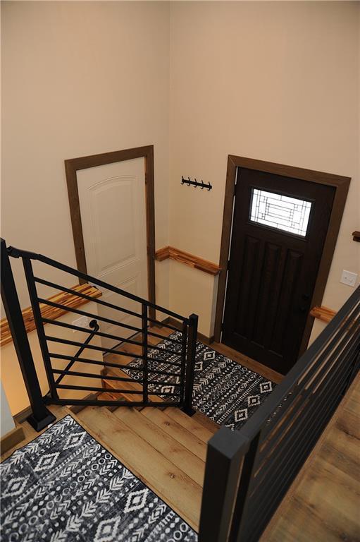 entrance foyer with hardwood / wood-style floors