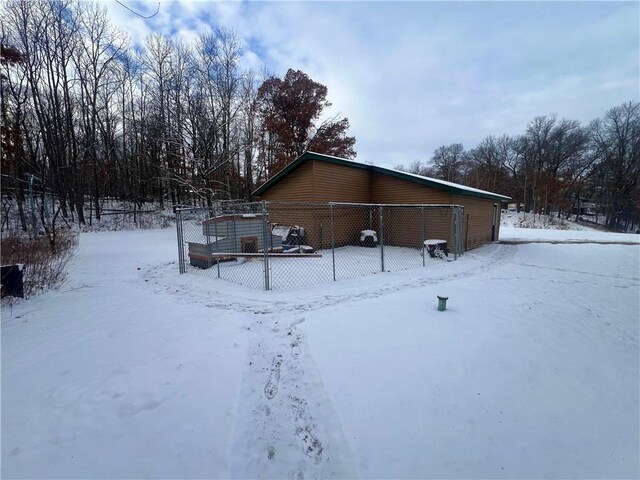 view of snow covered property