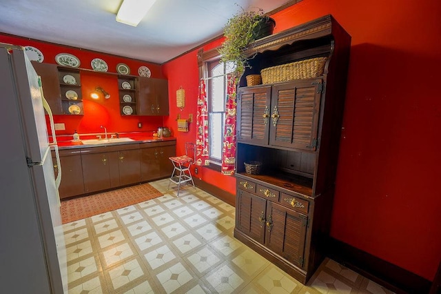 kitchen with sink and fridge