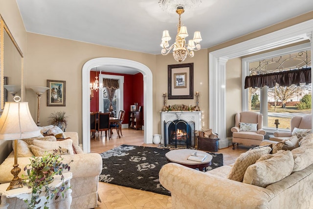 living room with a notable chandelier
