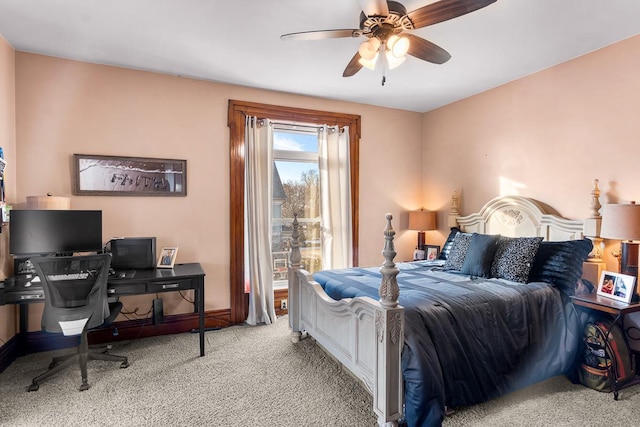 bedroom with ceiling fan and light carpet