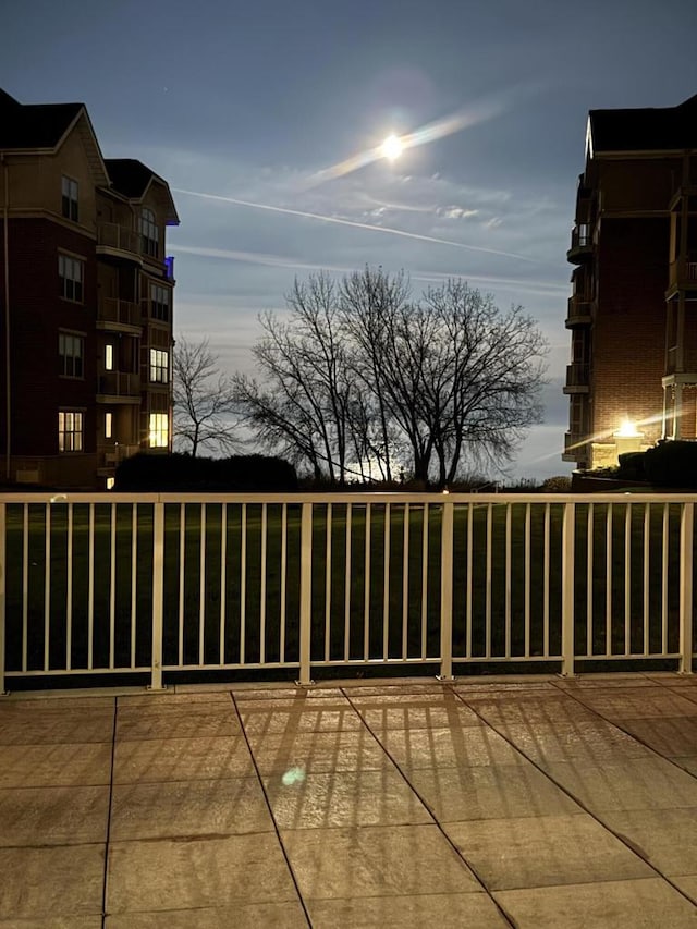 view of patio terrace at dusk