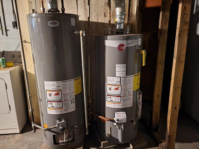 utilities featuring gas water heater and washer / clothes dryer