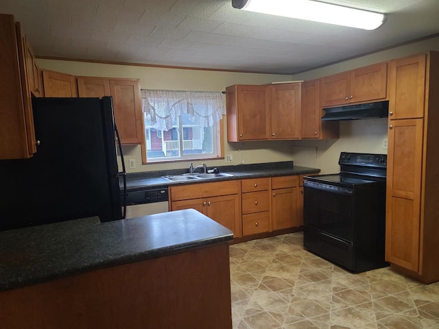 kitchen featuring black appliances, crown molding, and sink