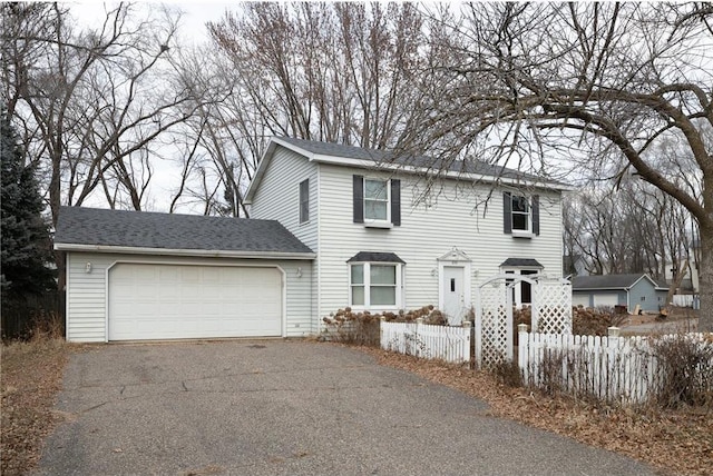 view of front of house with a garage