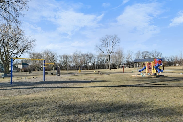 view of jungle gym with a lawn