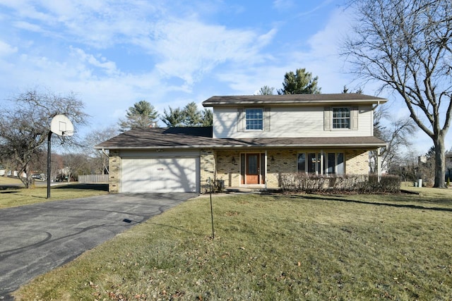 view of property featuring a garage and a front lawn