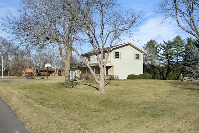 front facade with a front lawn