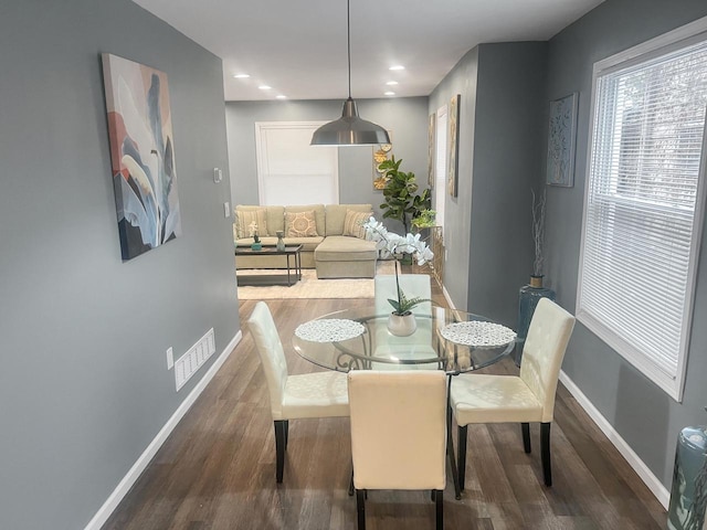 dining room featuring dark hardwood / wood-style floors