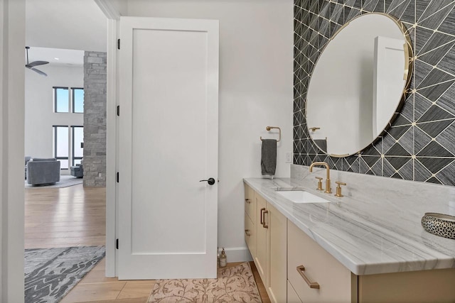 bathroom featuring hardwood / wood-style floors and vanity