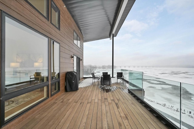 view of snow covered deck