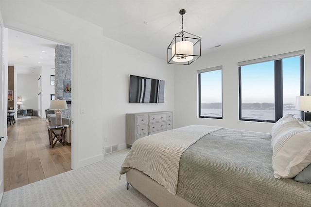 bedroom with light wood-type flooring