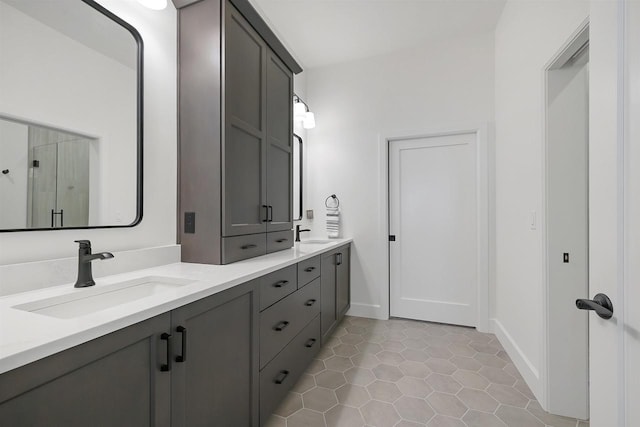 bathroom featuring tile patterned floors and vanity